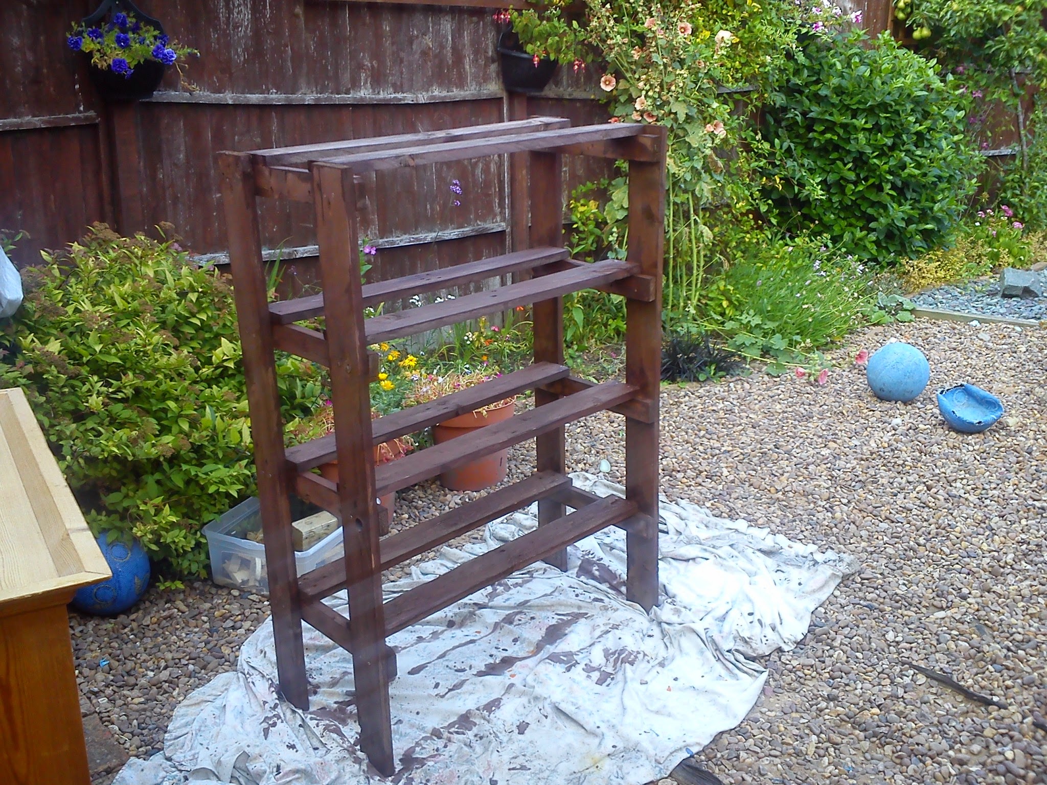 Shoe rack was painted with fence paint