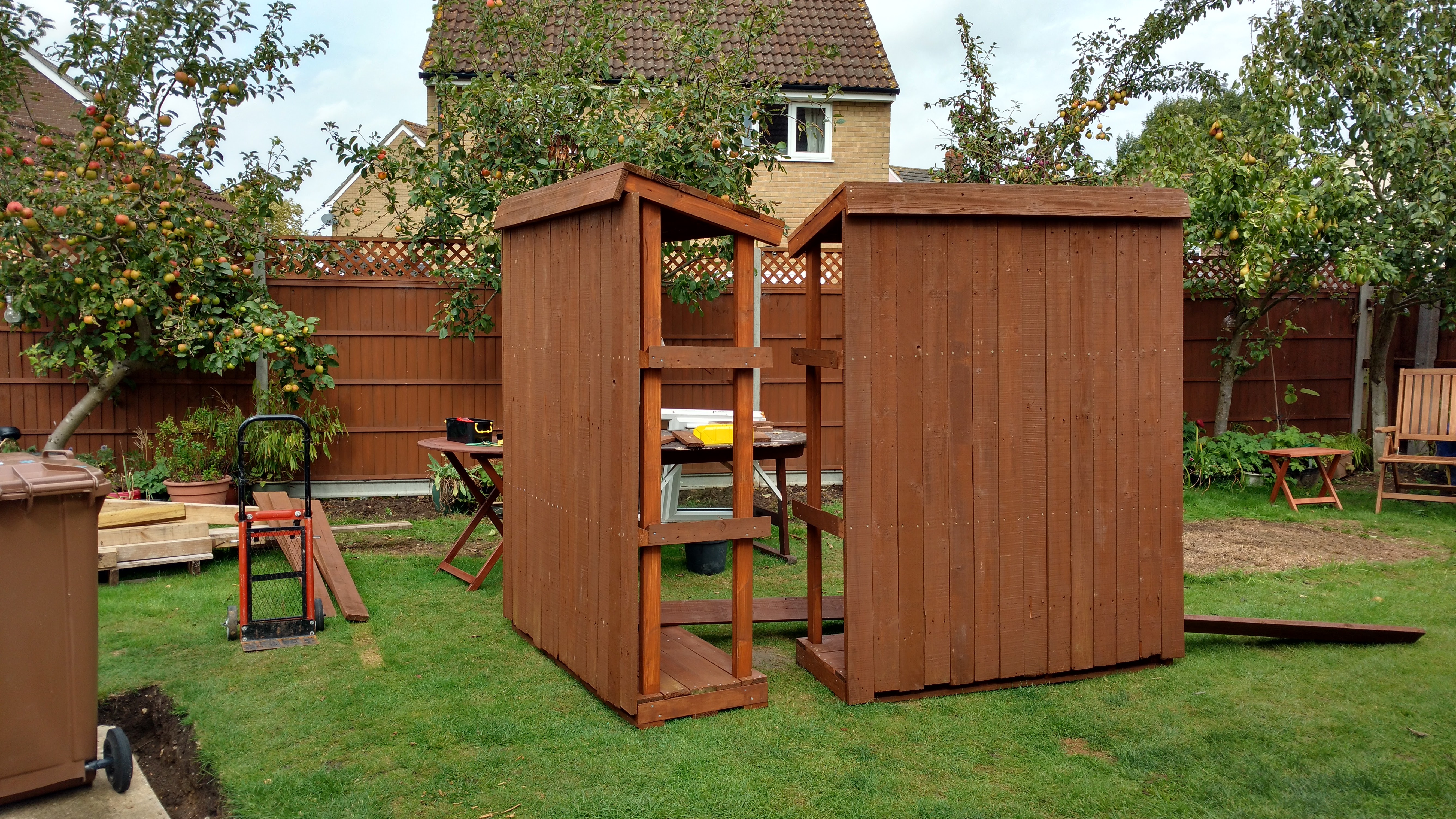 Another view of the two log stores with back panelling