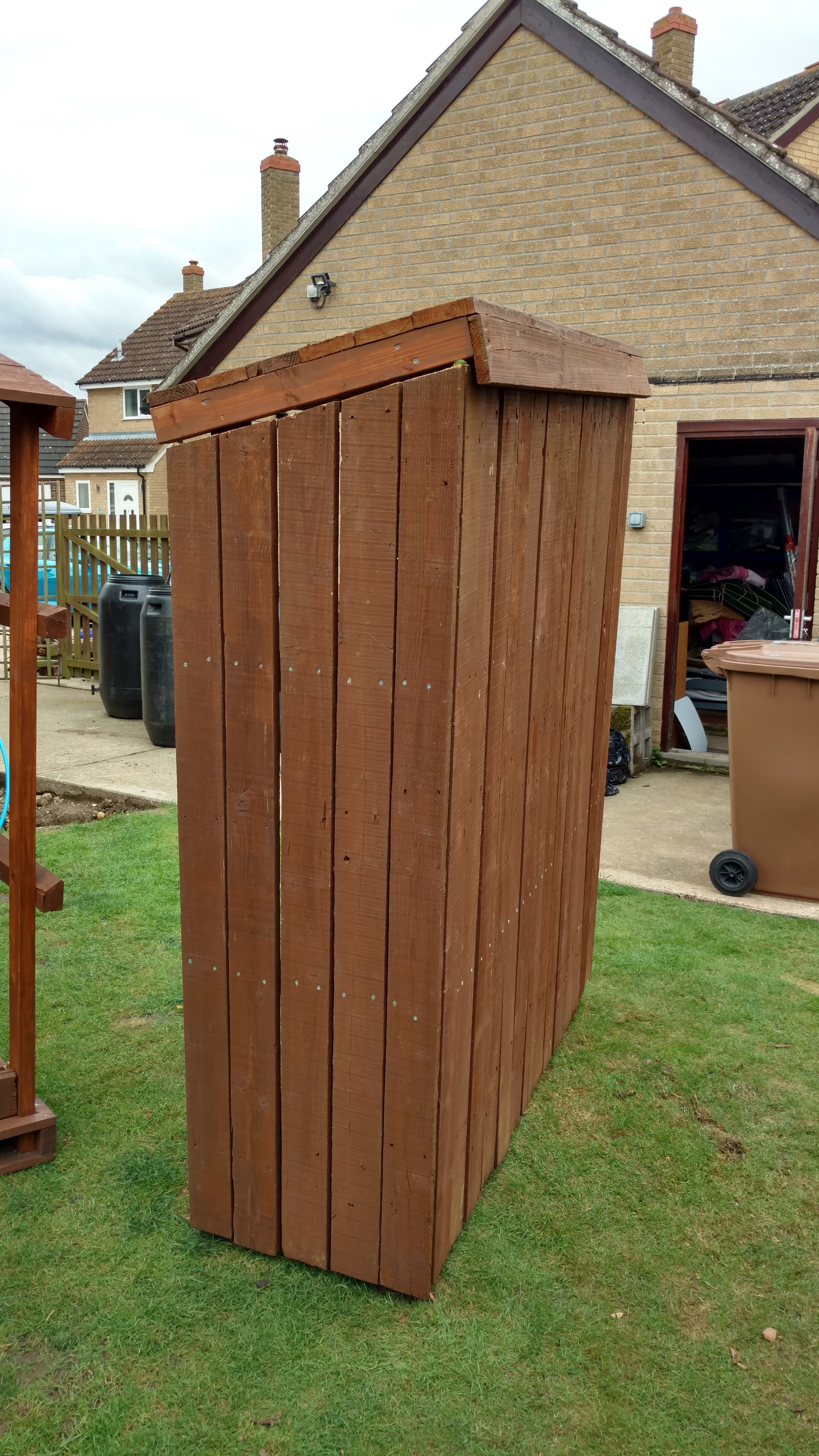 A completed log store without felt roof